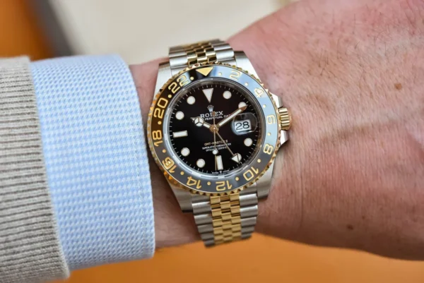 Rolex GMT-Master II, 40mm, Oystersteel and 18k Yellow Gold, Ref# 126713GRNR-0001 Watch - Replica - Image 2