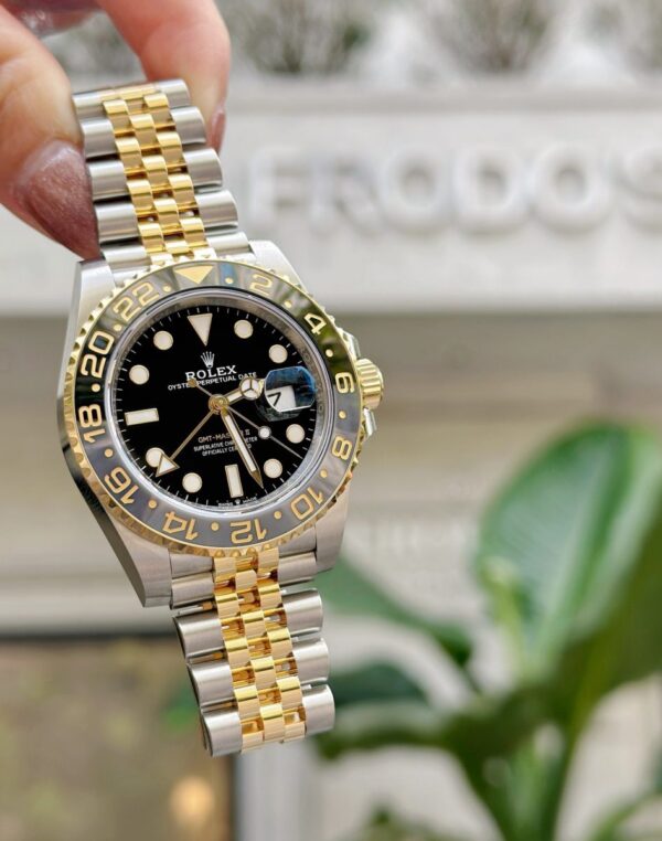 Rolex GMT-Master II, 40mm, Oystersteel and 18k Yellow Gold, Ref# 126713GRNR-0001 Watch - Replica - Image 6