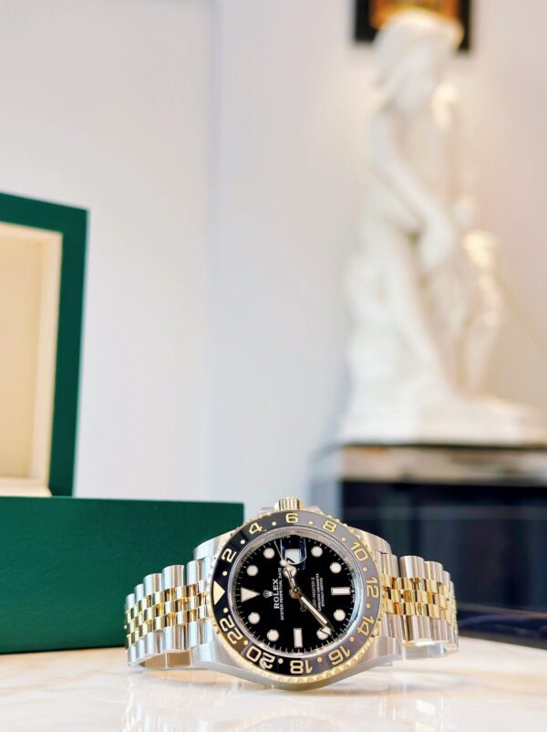 Rolex GMT-Master II, 40mm, Oystersteel and 18k Yellow Gold, Ref# 126713GRNR-0001 Watch - Replica - Image 4
