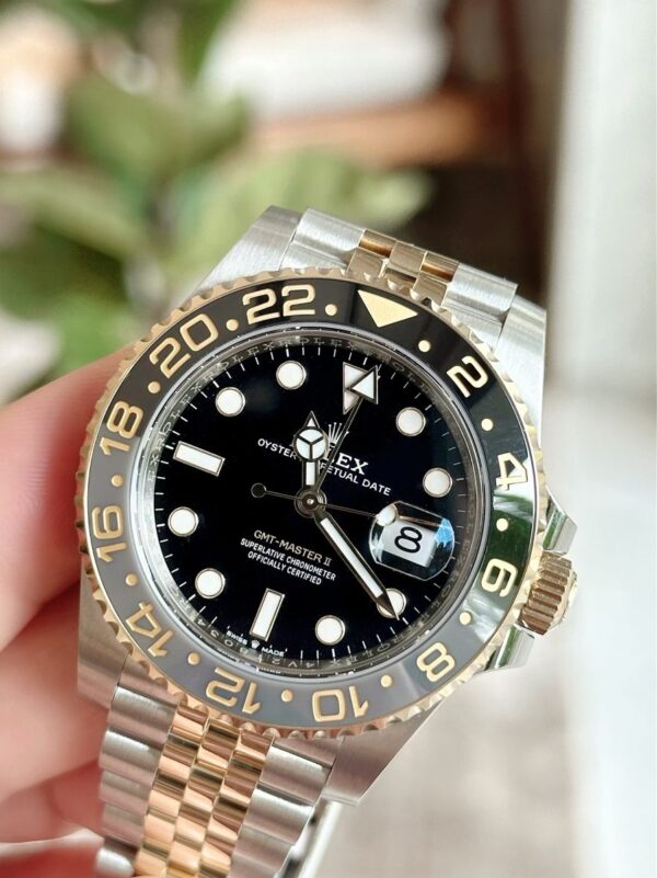 Rolex GMT-Master II, 40mm, Oystersteel and 18k Yellow Gold, Ref# 126713GRNR-0001 Watch - Replica - Image 3